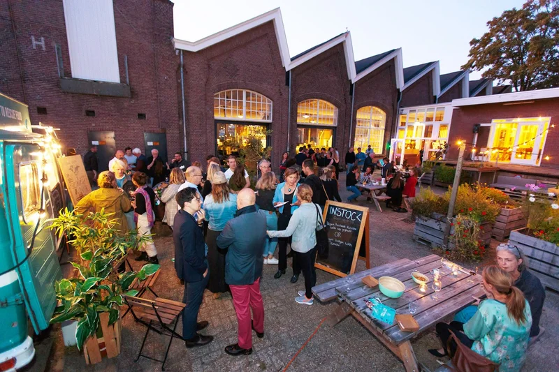 UCo courtyard gathering at dusk